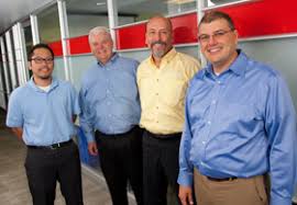 (From right) Jon Stevens, Senior Vice President, CIO and Operations Nick Schmidt, Senior Manager, IT Infrastructure, IT Operations Mike Pflieger, ... - cdw-ciscoteam