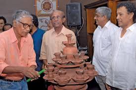 Dr Dhyarmasena Pathiraja lights the oil lamp. Prof Sunanda Mahendra, Dr Praneeth Abeysundara and Dr ariyaratne Vijaya Nandasiri Athugala look on. - z_p20-Mahasamayama-02