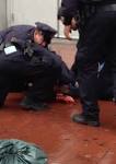 Cops kill hatchet-wielding man; bystander, cop seriously injured.