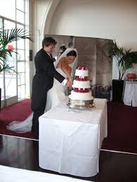 Luke and Kelly cutting their wedding cake | Photo - 800570-Luke-and-Kelly-cutting-their-wedding-cake-0