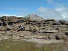 Weathered "pancakes" of ancient red sandstone can be seen in the foreground - via Daymix