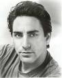 Scott Cohen who plays Wolf