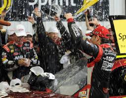 ... celebrates his victory in the Pennsylvania 400 at Pocono Raceway in Long Pond, Pa., Sunday, Aug. 5, 2012. Race was shortened due to rain. By Bill Huneke - 11395939-large