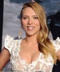 SCARLETT JOHANSSON shows off her baby bump at Captain America.