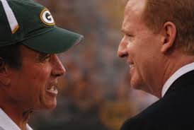 Dom Capers (left) shares some words with NFL Commissioner Roger Goodell. Raymond T. Rivard photograph - DSC_0061