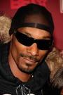 Dogg, whose real name is Cordozar Calvin Broadus, sings and acts in a ... - snoop
