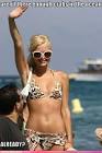 http://cdn.lolcaption.com/wp-content/uploads/2009/11/celebrity-pictures-paris-hilton-crabs-ocean.jpg