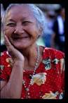 A grandmother with a captivating apple-doll face and smiling eyes is ... - baclaran_smiling_lady_1