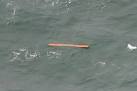 QZ8501 live report: Rescuers start retrieving bodies, debris from.