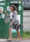 Michelle Keegan drops items off at a clothing bank as filming.