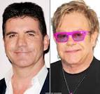 Simon Cowell Beats Elton John
