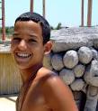 Stock Photo of cuba boy teen smile tan child work beach indigenous play - jh8148