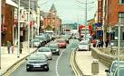 traffic-choked strip of raucous amusement arcades and fast-food outlets. - via Daymix