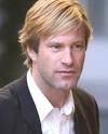 Whitman): Aaron Eckhart
