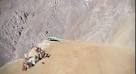 Video: Dirt bike jump into a few thousand feet deep valley