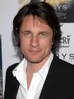 MARTIN HENDERSON - Zap2it