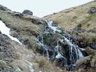 Snow melt. A small waterfall on the Glenach Burn. - via Daymix