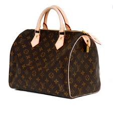 http://t2.gstatic.com/images?q=tbn:Cl-ewp3mim6CFM:inandoutblog.files.wordpress.com/2008/12/sac-a-main-vuitton.jpg