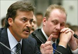 Rafael Palmeiro, left, of the