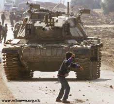 اجمل مل قيل عن فلسطين.توقف و اقرا Palestine-boy-tank