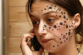 girl face tattoo