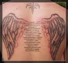 cross and angel wing tattoo