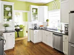 Green walls set the tone for this soothing kitchen