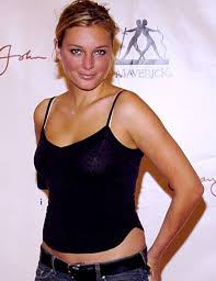 Bridget Hall is an American supermodel. She was born on December 12, 1977 in Springdale, Arkansas. At the age of 10, she was modeling in Dallas, Texas where she was living in the suburb of Farmers Branch, Texas.