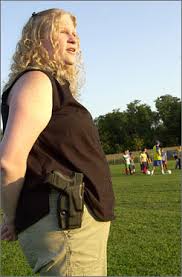 Meleanie Hain wears her weapon