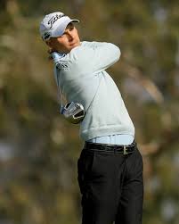 Ben Crane hits his his tee shot on the second hole on the South Course at Torrey Pines Golf Course during the final round of the Farmers Insurance Open on
