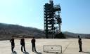 NORTH KOREA moves rocket into position for launch | World news ...
