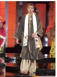 أزياء تقليدية مغربية أنيقة  Images?q=tbn:ANd9GcQKwwB4Qt2vS5ONqEftJQY_y0LpfzMcCBL2zMlt47WunFouZ5Z3