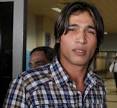 Mohammad Amir arrives at the airport to leave for his hearing in Dubai, ...