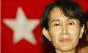 Myanmar democracy leader Aung San Suu Kyi listens - Myanmar-democracy-leader--001