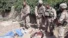 Video shows what appear to be U.S. Marines urinating on bodies - CNN.