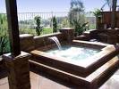 Bathroom: Square Hot Tubs With Stone Wall And Steel Fence On ...