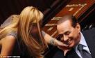 Silvio Berlusconi flirts with female colleague in parliament