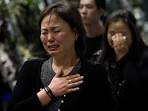 South Korean ferry disaster: Death toll rises as divers retrieve.