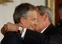 photo: AP / Ron Edmonds. President George W. Bush attaches the Presidential ... - 1c543592be952cc792c1f3e00e68-grande