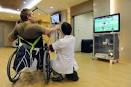 GREYING SINGAPORE TAPS ROBOTS, GAMES IN REHAB