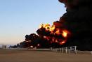 Islamists torch Libyan oil terminal in rocket assault - Independent.ie
