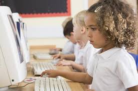 Image result for child taking test elementary school computer