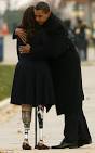 Obama's hug for amputee Iraq war veteran as America honours its