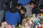 NYPD Officer Wenjian Lius family weep at shooting spot - NY Daily.