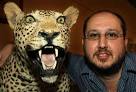 The Leopard's Spot owner Louis Adendorff with the stuffed leopard that is a ... - 4529837