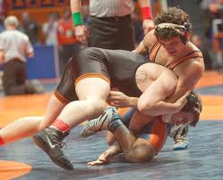 Austin Armetta, Mahomet, battles Frank Abitua, Crystal Lake, in the 160-pound 2A quarterfinals of the IHSA State Wrestling Tournament at the Assembly Hall ... - web_0219_spor_WRTL-Armetta-