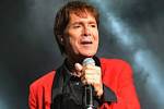 CLIFF RICHARD denies allegations of sexual assault as police raid.