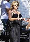 Pregnant CaCee Cobb reveals growing baby bump in black maxi dress