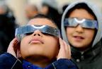 (AP / Petros Giannakouris). Children wear special glasses as they watch the ... - 001p7b0h