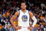 Andre Iguodala throws down a double pump dunk in a game he would.